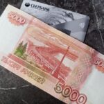 Снять наличные можно на кассе в магазинах